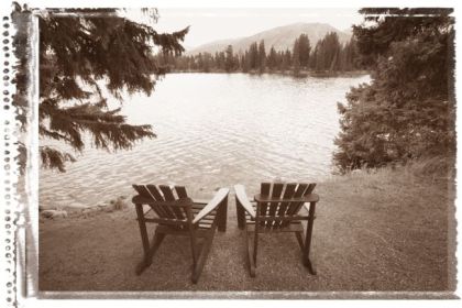 Empty Chairs On Waterfront